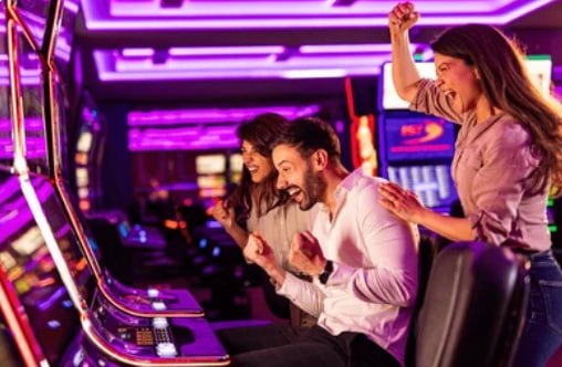Filipino player spinning a slot game on a mobile phone using 7win
